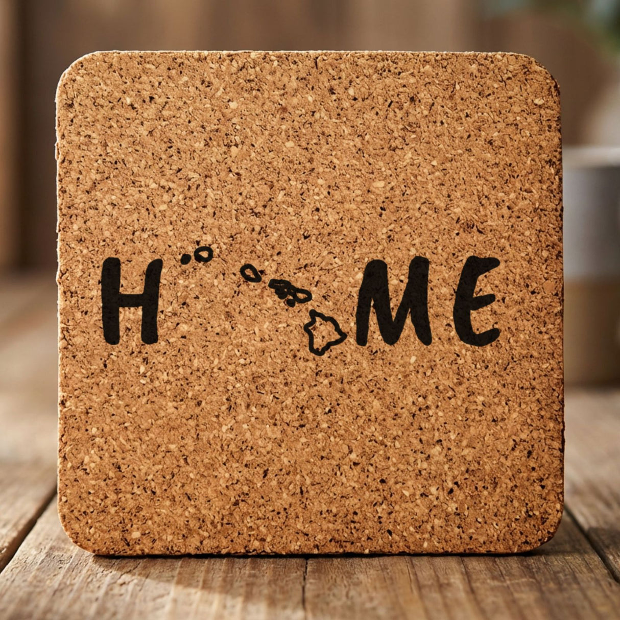 Hawaii square cork coaster engraved with HOME using the state outline as the letter O