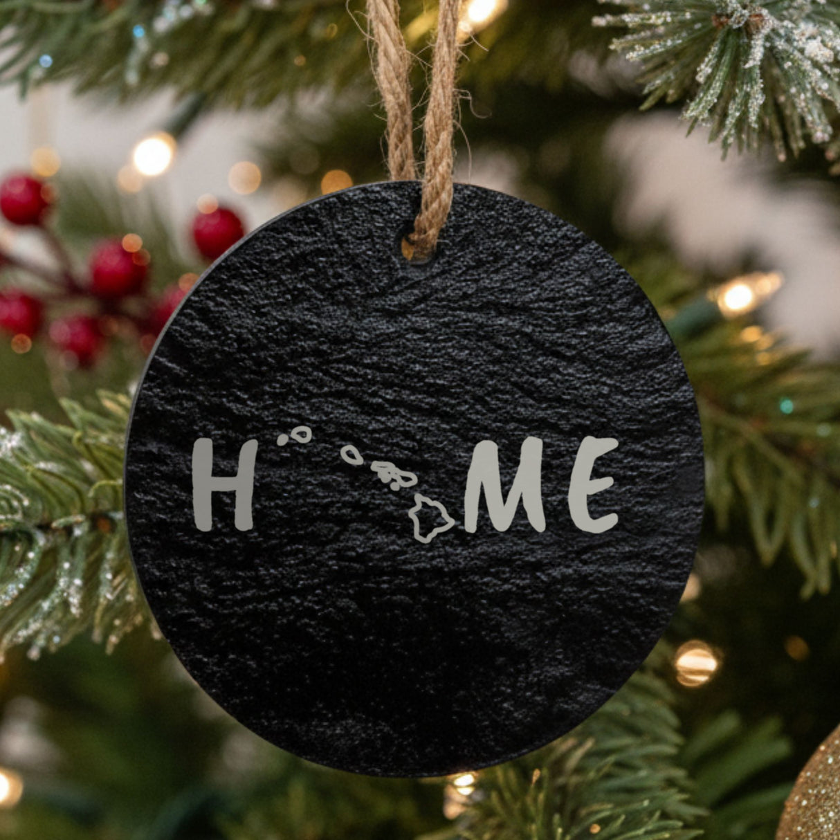 Hawaii round slate Christmas ornament engraved with HOME using the state outline as the letter O