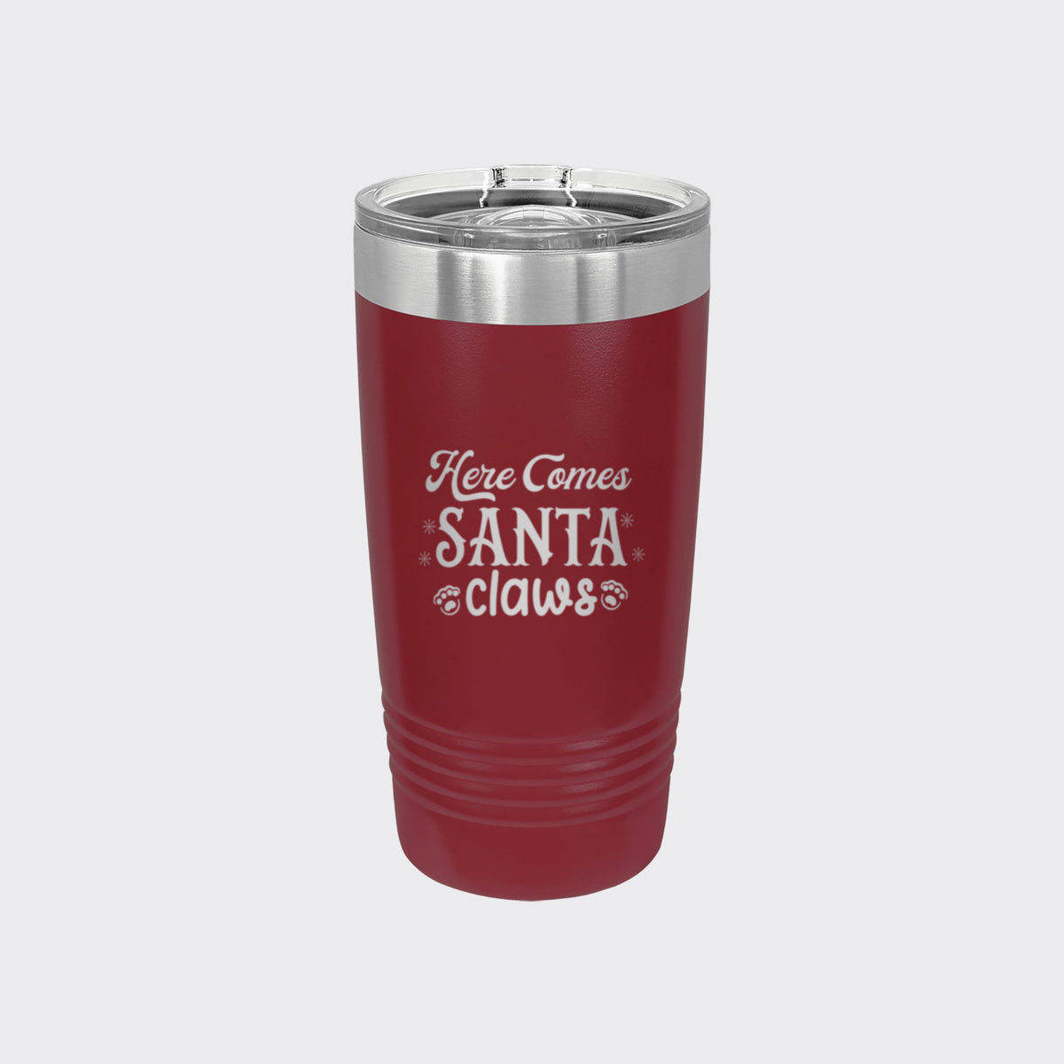 Maroon 20 oz tumbler laser engraved with "Here Comes Santa Claws"