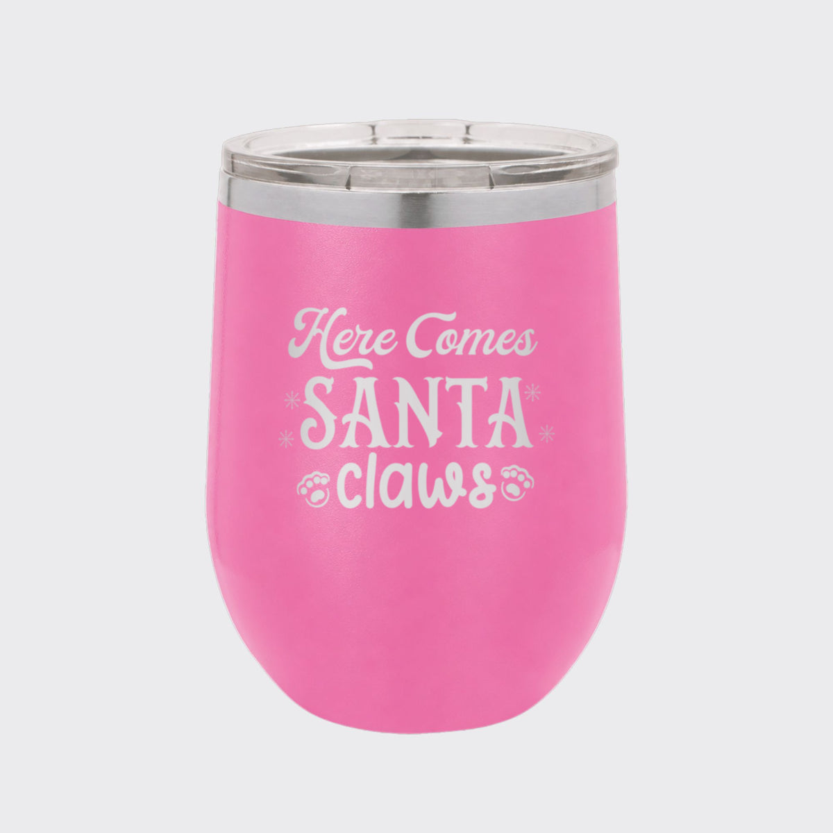 Pink 12 oz stemless wine tumbler laser engraved with "Here Comes Santa Claws"