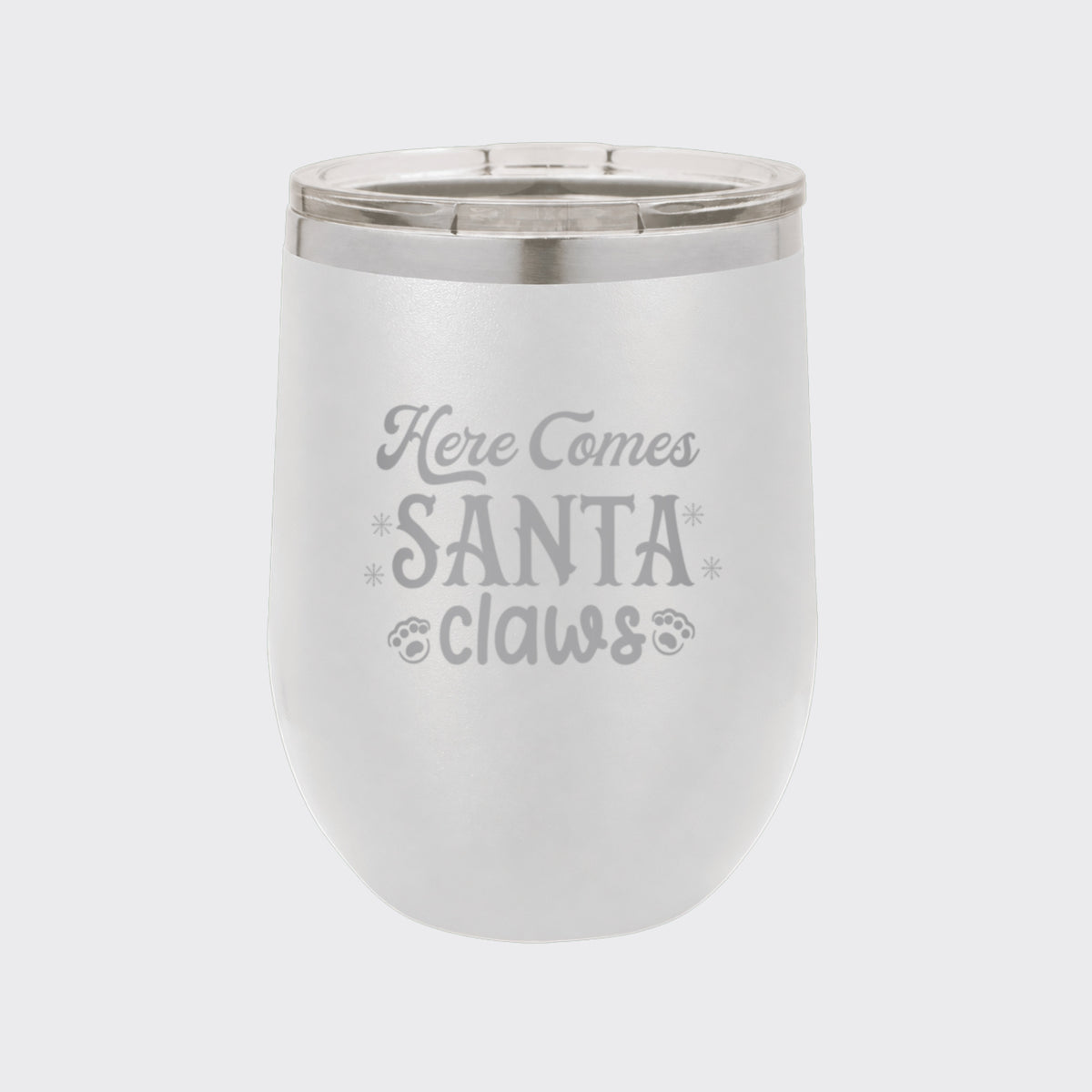 White 12 oz stemless wine tumbler laser engraved with "Here Comes Santa Claws"