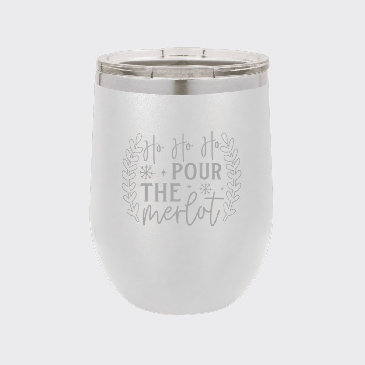 White 12 oz stemless wine tumbler laser engraved with "Ho Ho Ho, Pour the Merlot"
