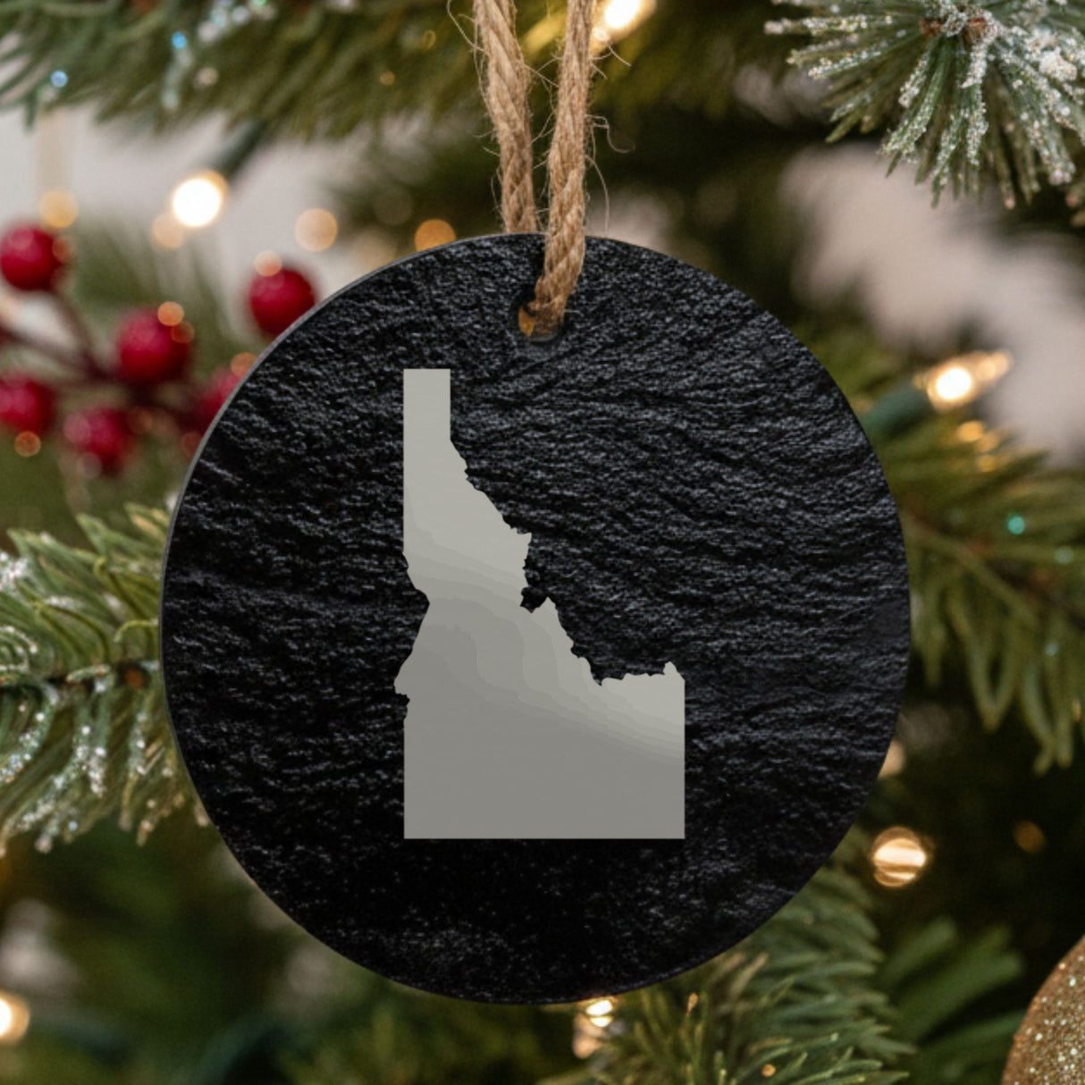 Idaho round slate Christmas ornament with the full state shape engraved