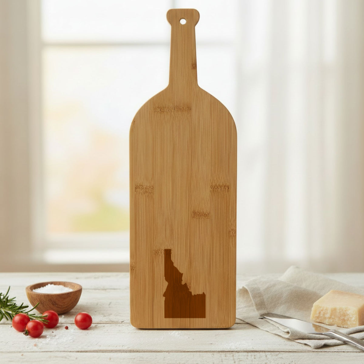 Bamboo wine bottle cutting board engraved with the Idaho Engraved State design