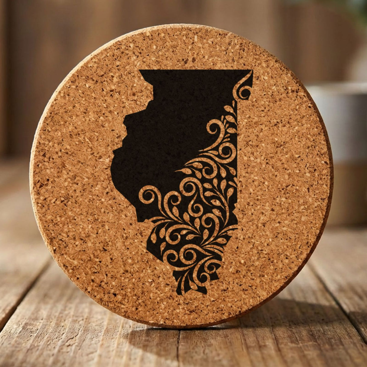 Illinois round cork coaster engraved with the state shape in ornate floral scrollwork