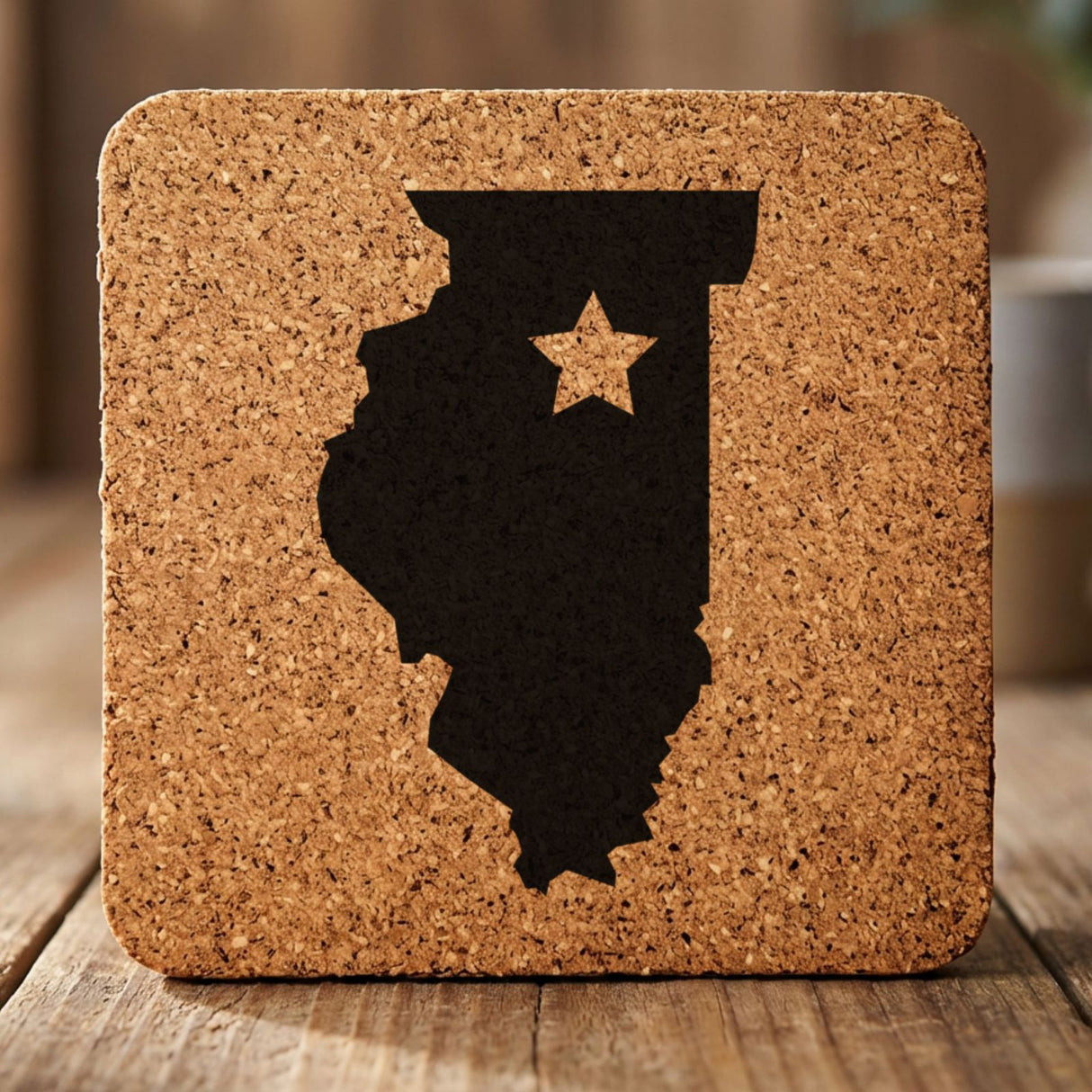 Illinois square cork coaster engraved with the state shape and a star