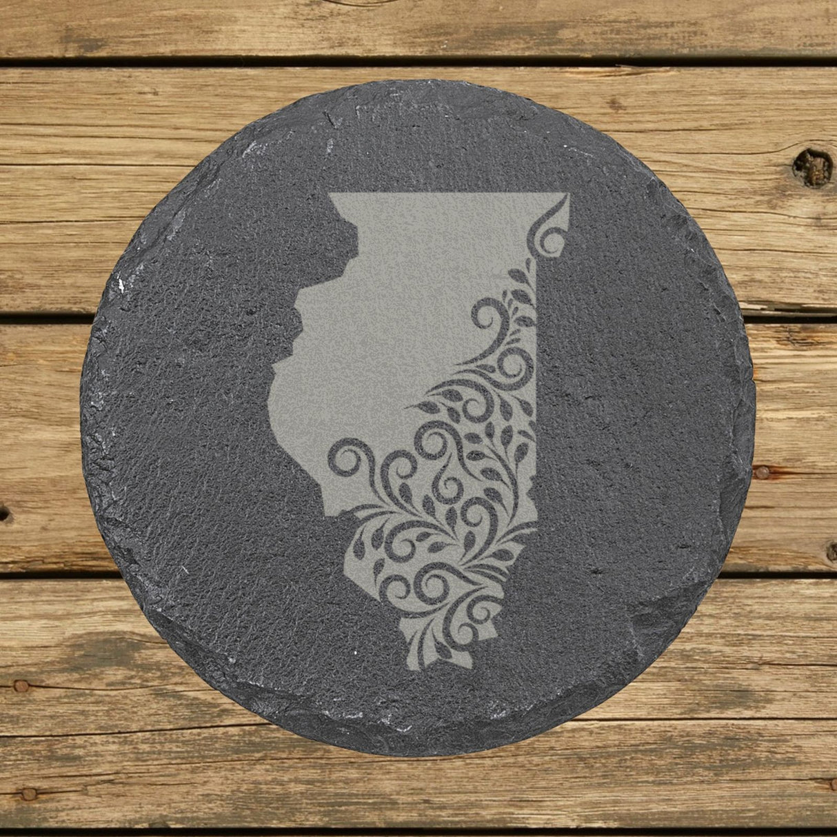 Illinois round slate coaster engraved with the state shape in ornate floral scrollwork
