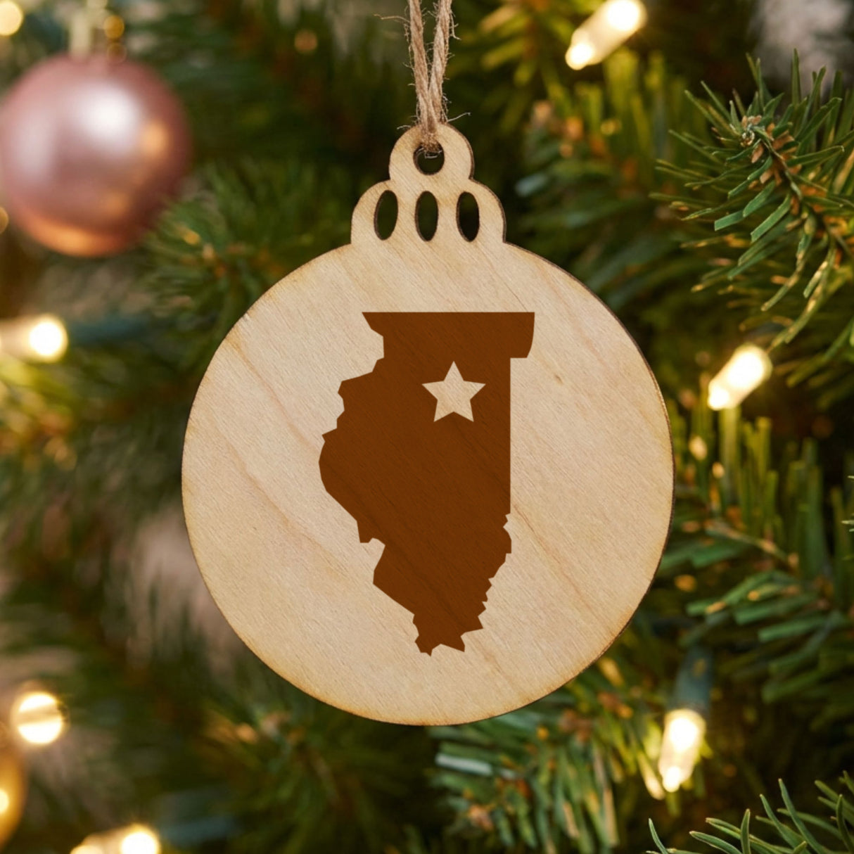 Illinois round wood Christmas ornament engraved with the state shape and a star