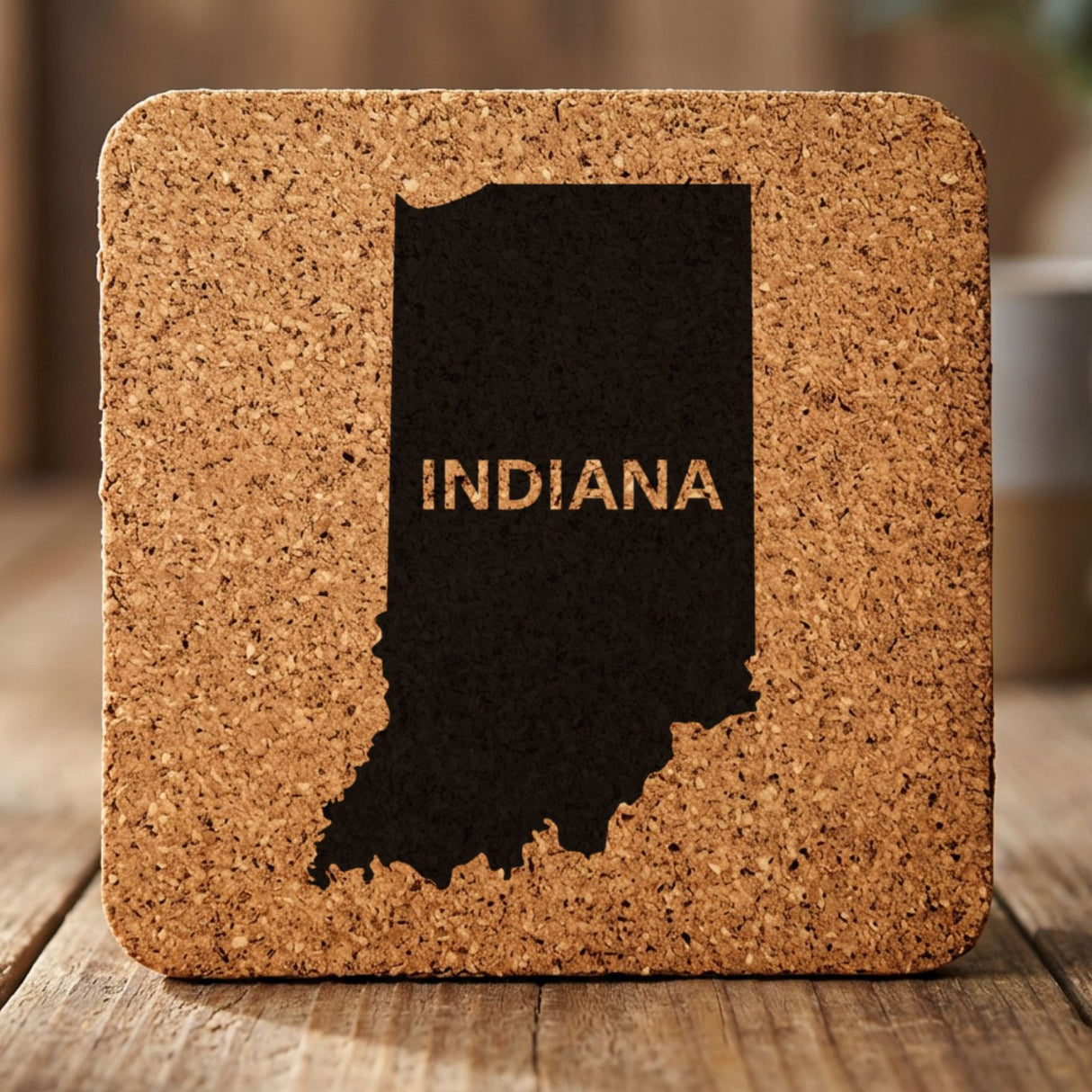 Indiana square cork coaster engraved with the state shape and INDIANA in bold lettering
