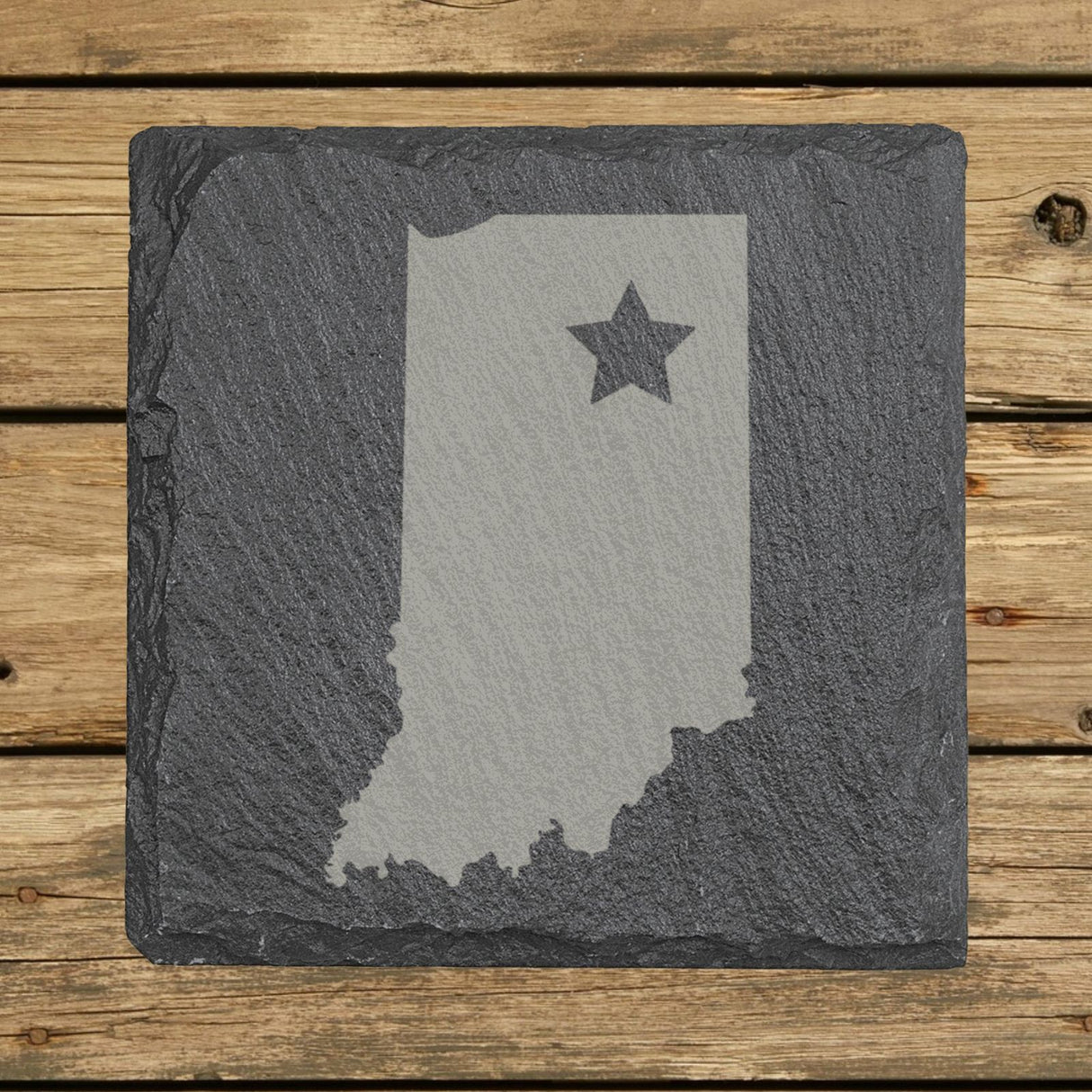 Indiana square slate coaster engraved with the state shape and a star