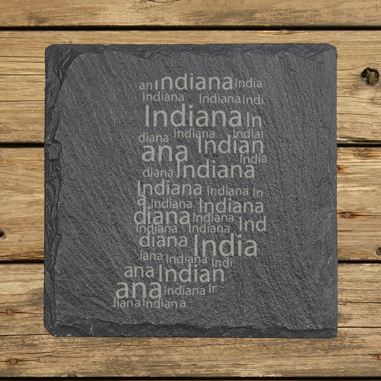 Indiana square slate coaster engraved with a word cloud of repeating Indiana text