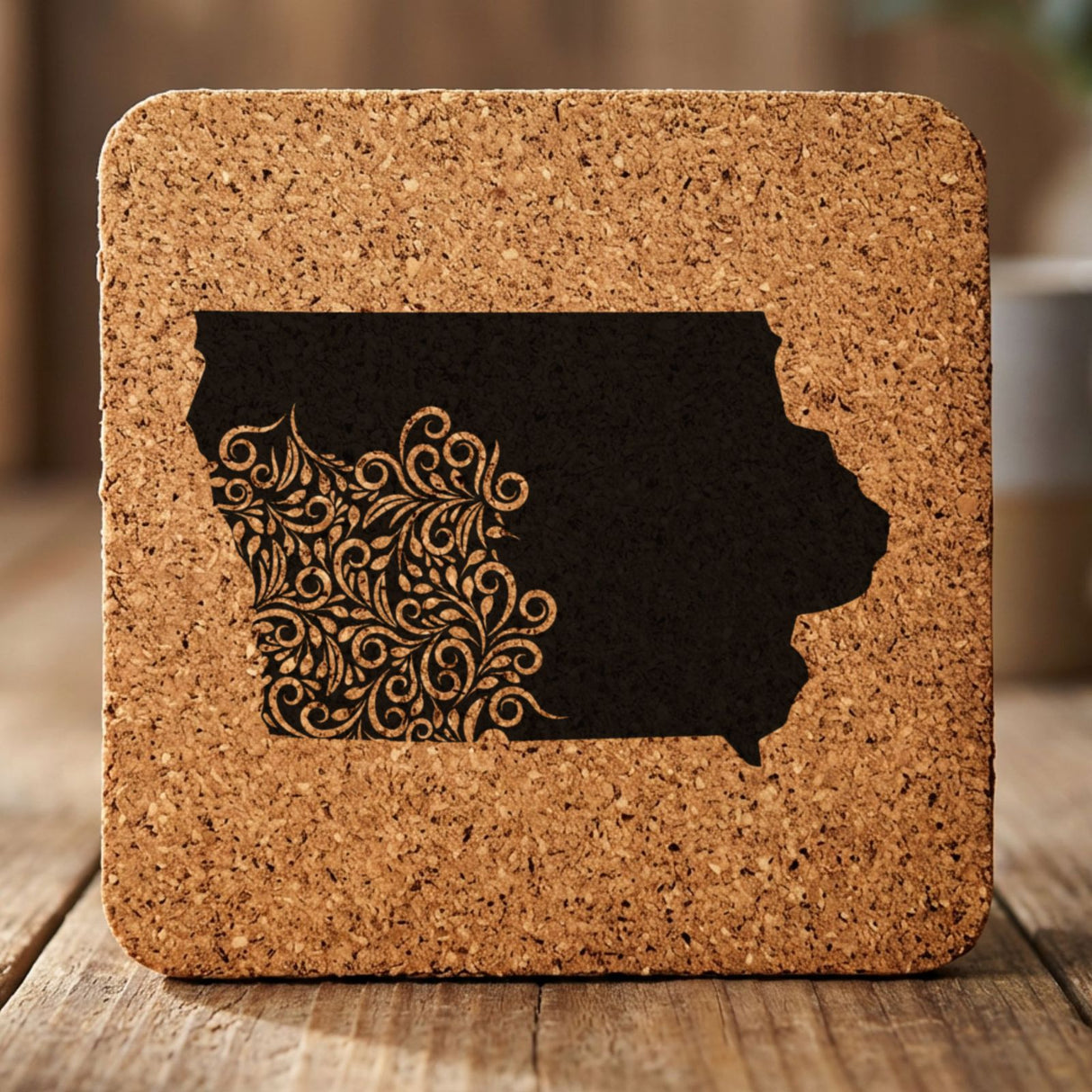 Iowa square cork coaster engraved with the state shape in ornate floral scrollwork