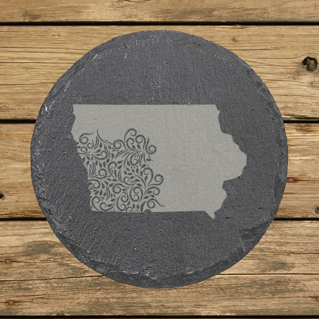Iowa round slate coaster engraved with the state shape in ornate floral scrollwork