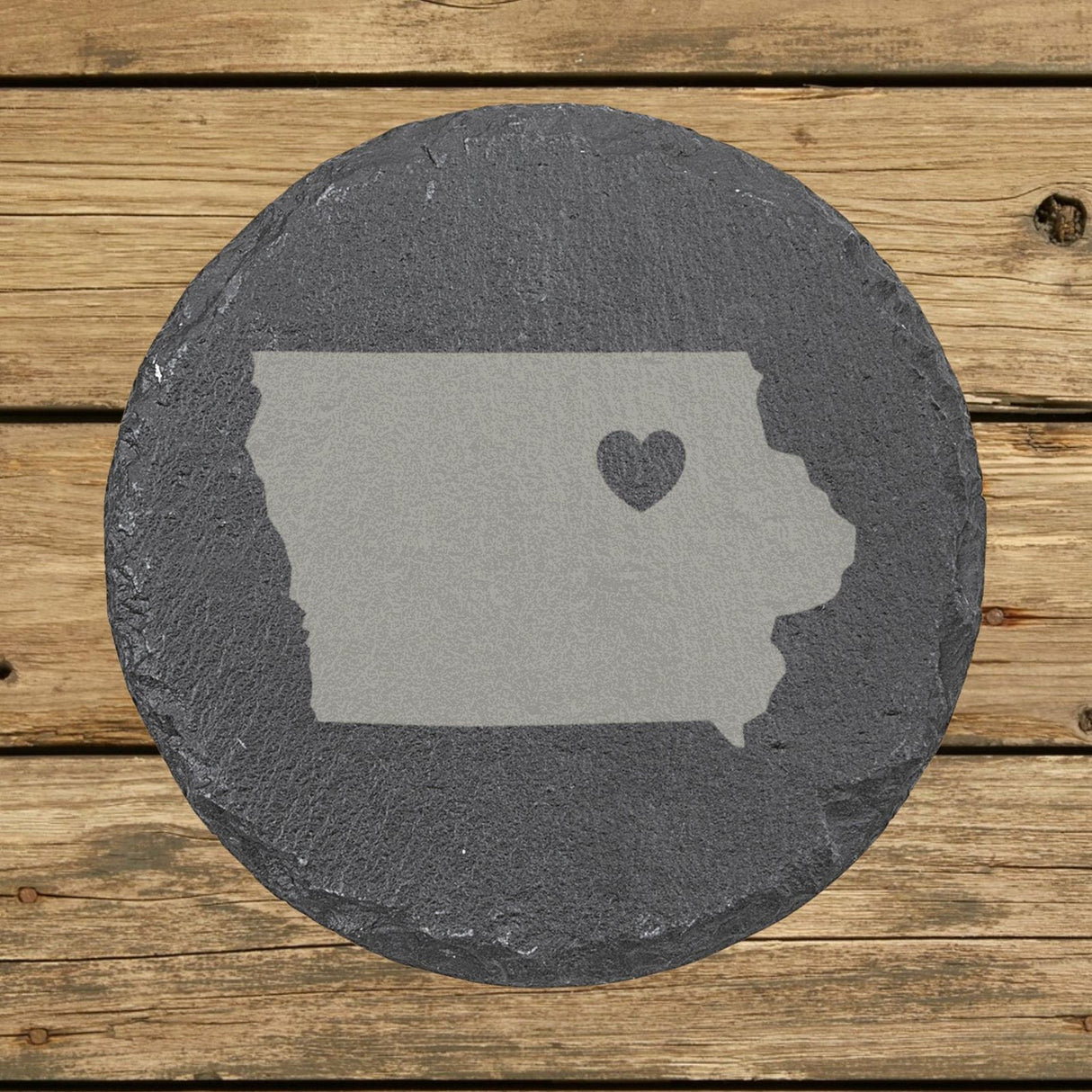 Iowa round slate coaster engraved with the state shape and a heart