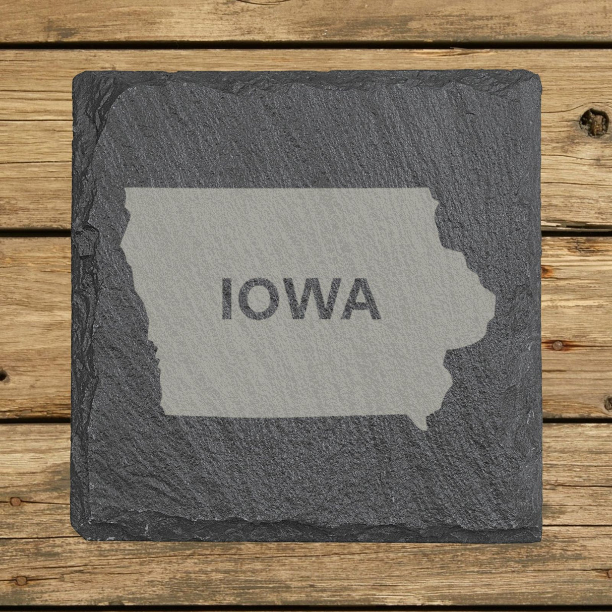 Iowa square slate coaster engraved with the state shape and IOWA in bold lettering