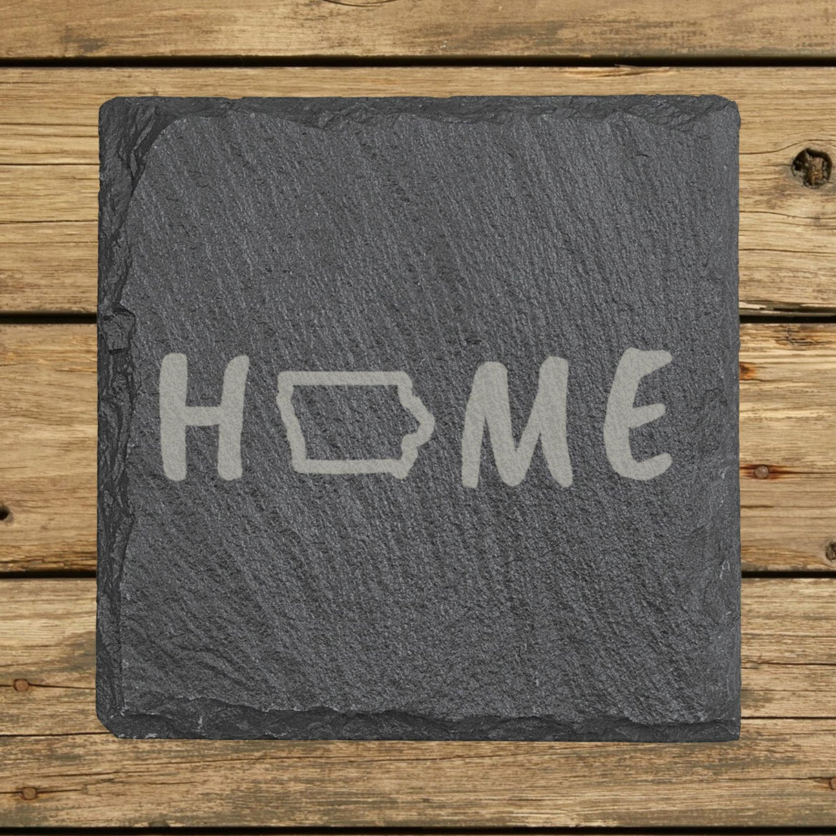 Iowa square slate coaster engraved with HOME using the state outline as the letter O