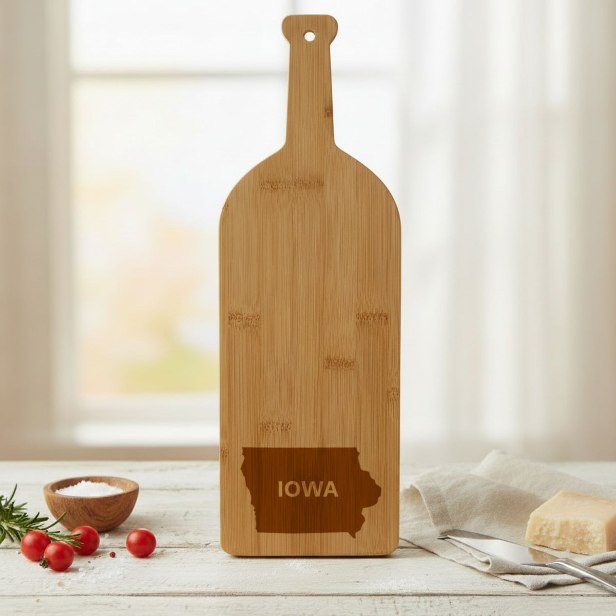 Bamboo wine bottle cutting board engraved with the Iowa Bold State Name design