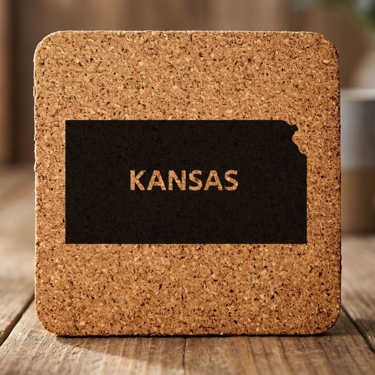 Kansas square cork coaster engraved with the state shape and KANSAS in bold lettering