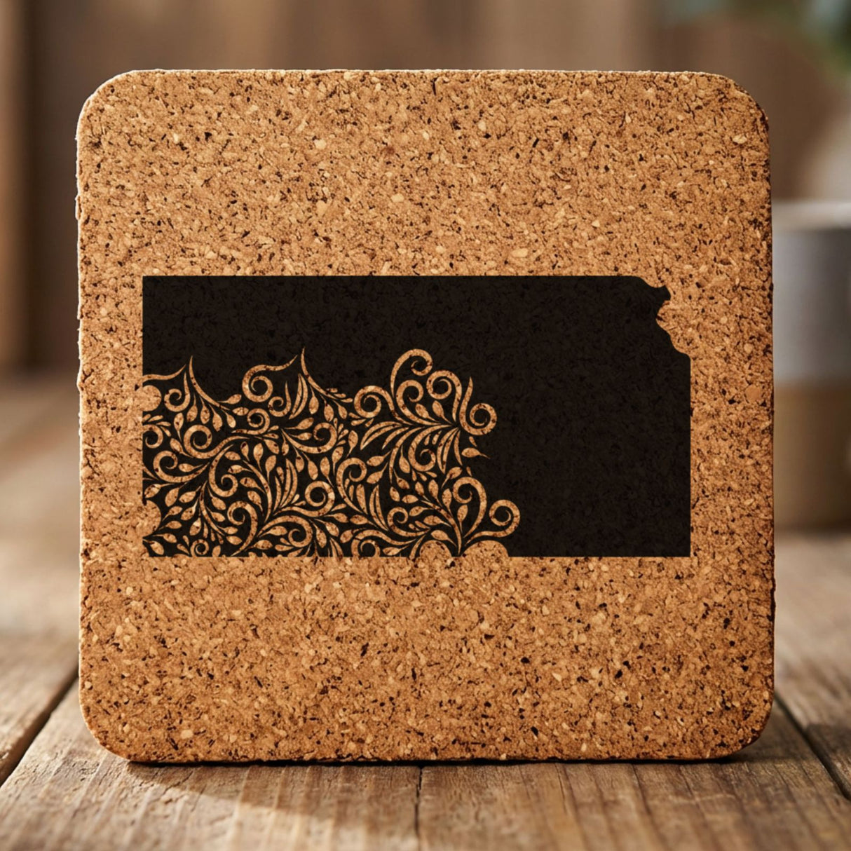 Kansas square cork coaster engraved with the state shape in ornate floral scrollwork