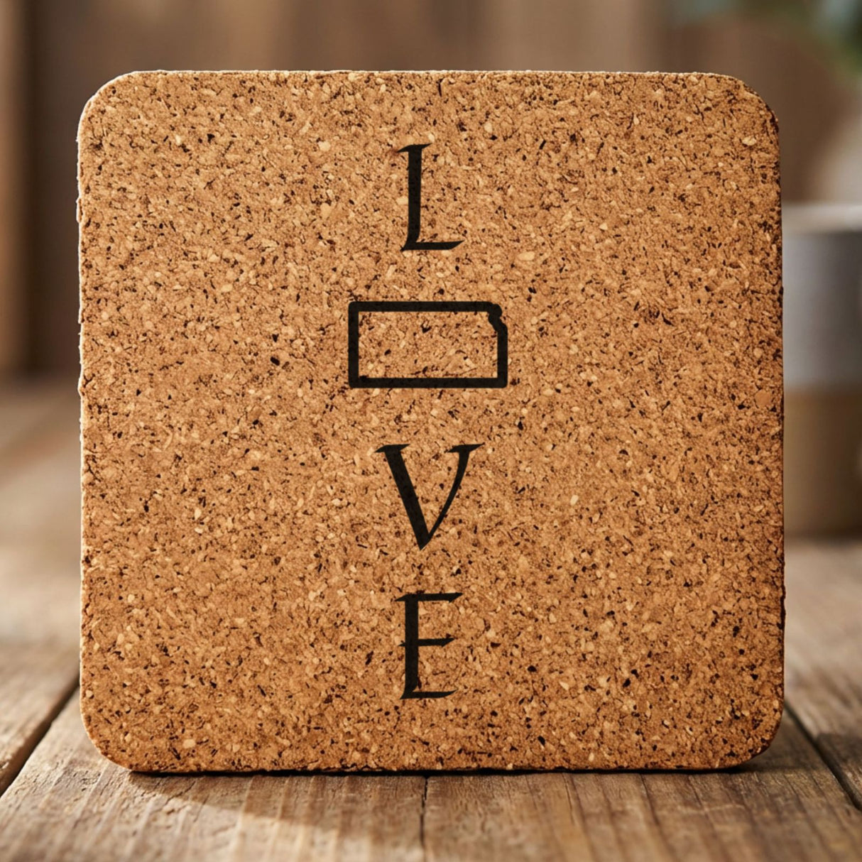 Kansas square cork coaster engraved with LOVE stacked vertically using the state as the letter O