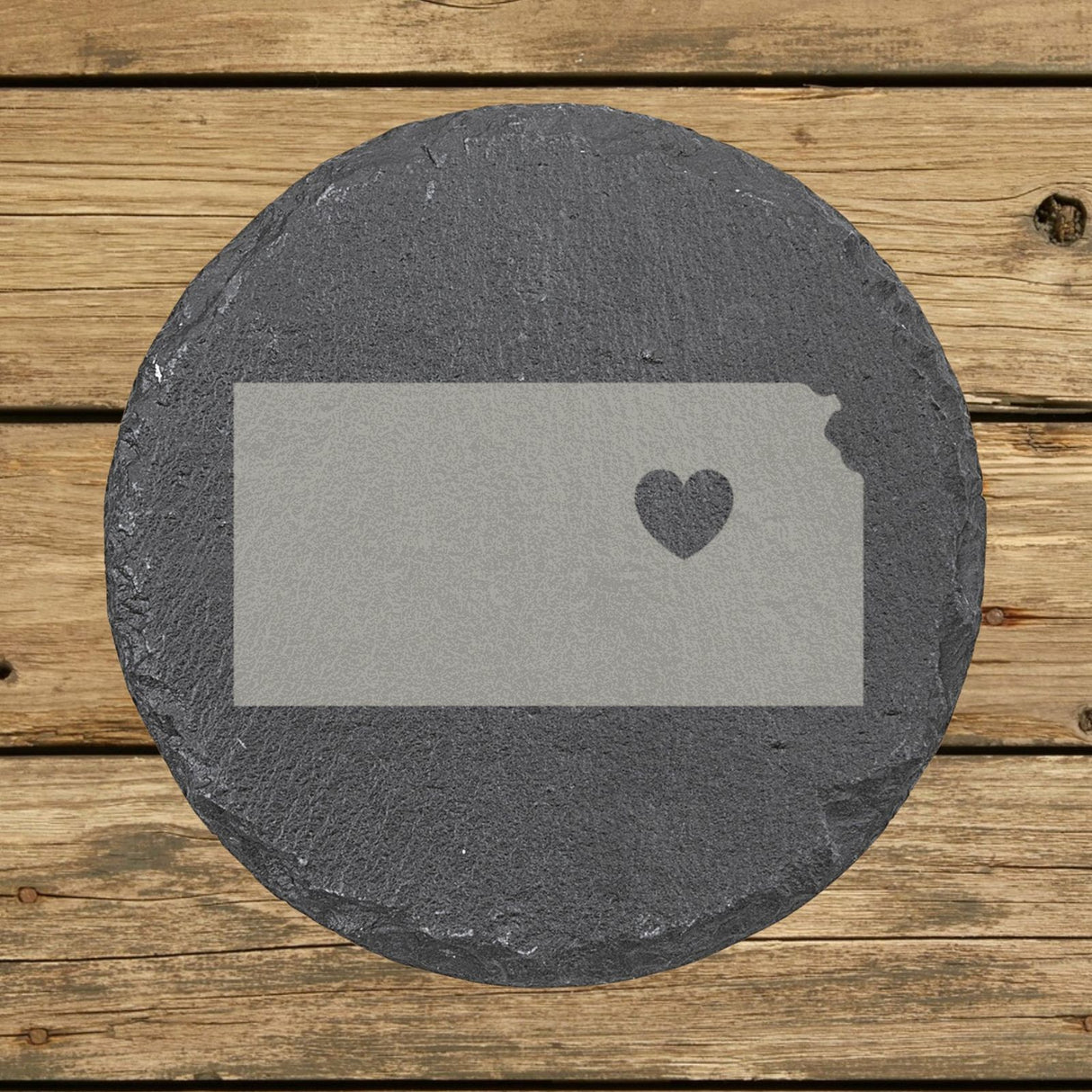 Kansas round slate coaster engraved with the state shape and a heart