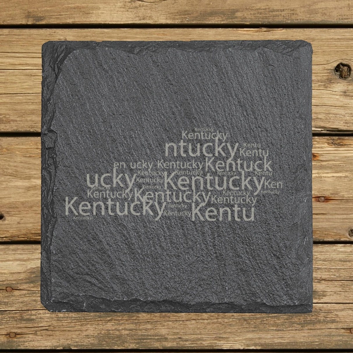 Kentucky square slate coaster engraved with a word cloud of repeating Kentucky text