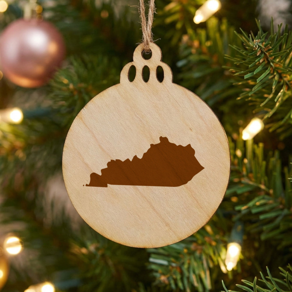 Kentucky round wood Christmas ornament with the full state shape engraved