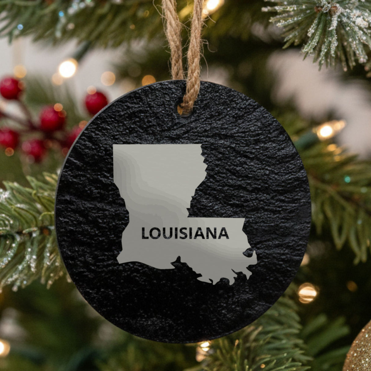 Louisiana round slate Christmas ornament engraved with the state shape and LOUISIANA in bold lettering