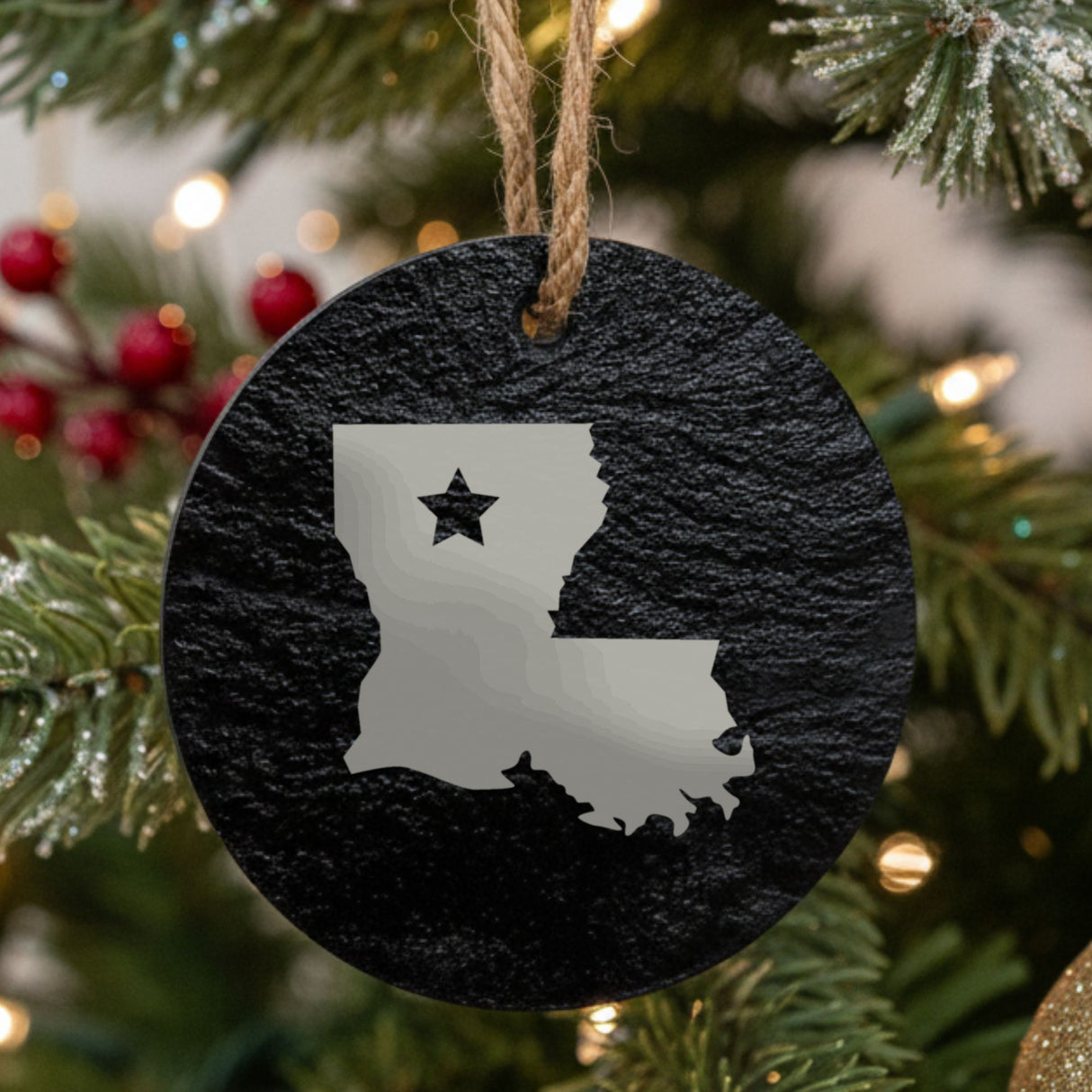 Louisiana round slate Christmas ornament engraved with the state shape and a star