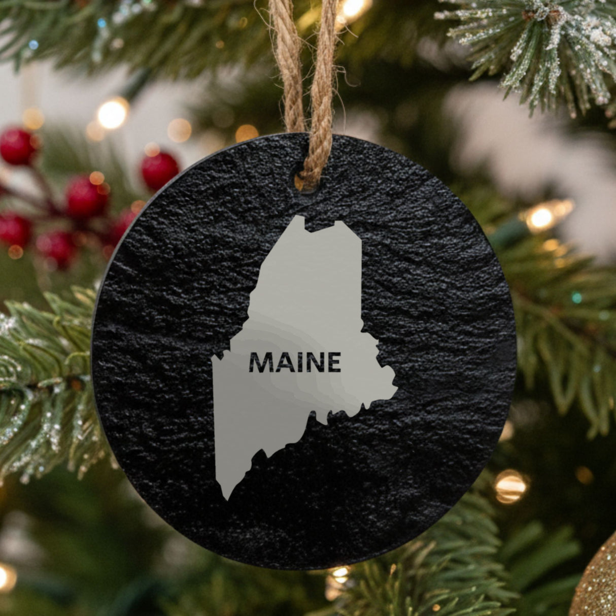 Maine round slate Christmas ornament engraved with the state shape and MAINE in bold lettering