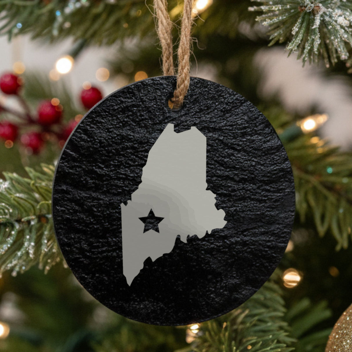 Maine round slate Christmas ornament engraved with the state shape and a star