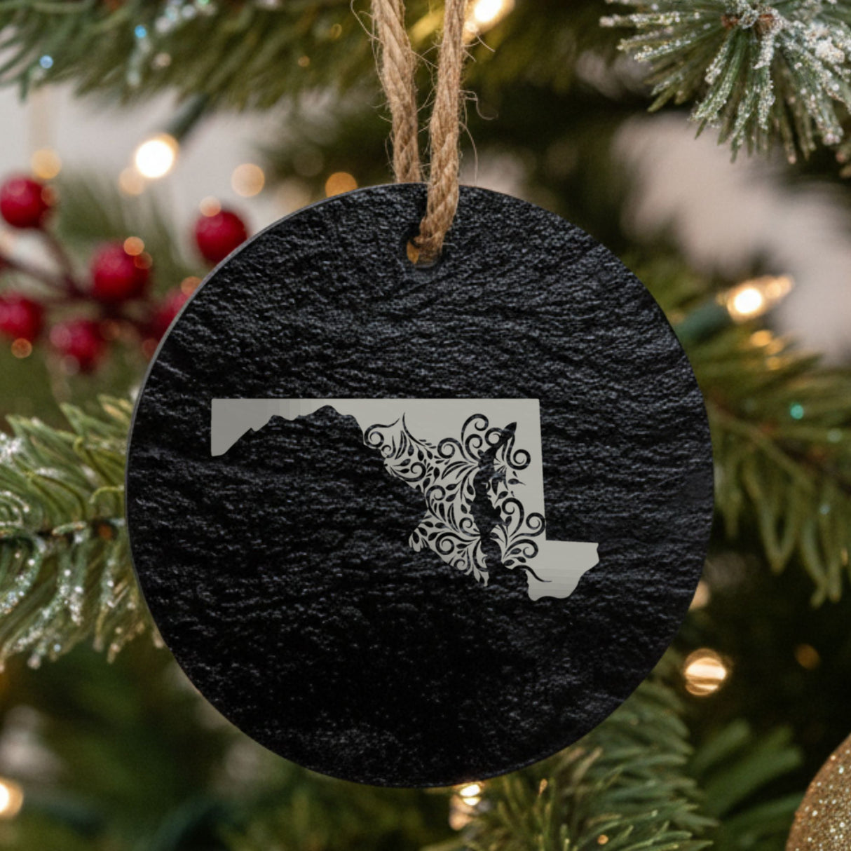 Maryland round slate Christmas ornament engraved with the state shape in ornate floral scrollwork