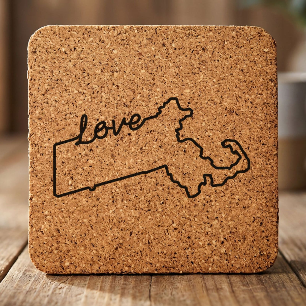 Massachusetts square cork coaster engraved with a hand-drawn state outline and love in cursive