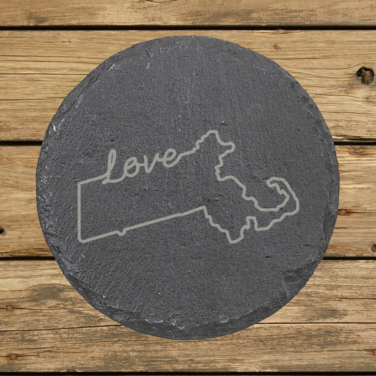 Massachusetts round slate coaster engraved with a hand-drawn state outline and love in cursive