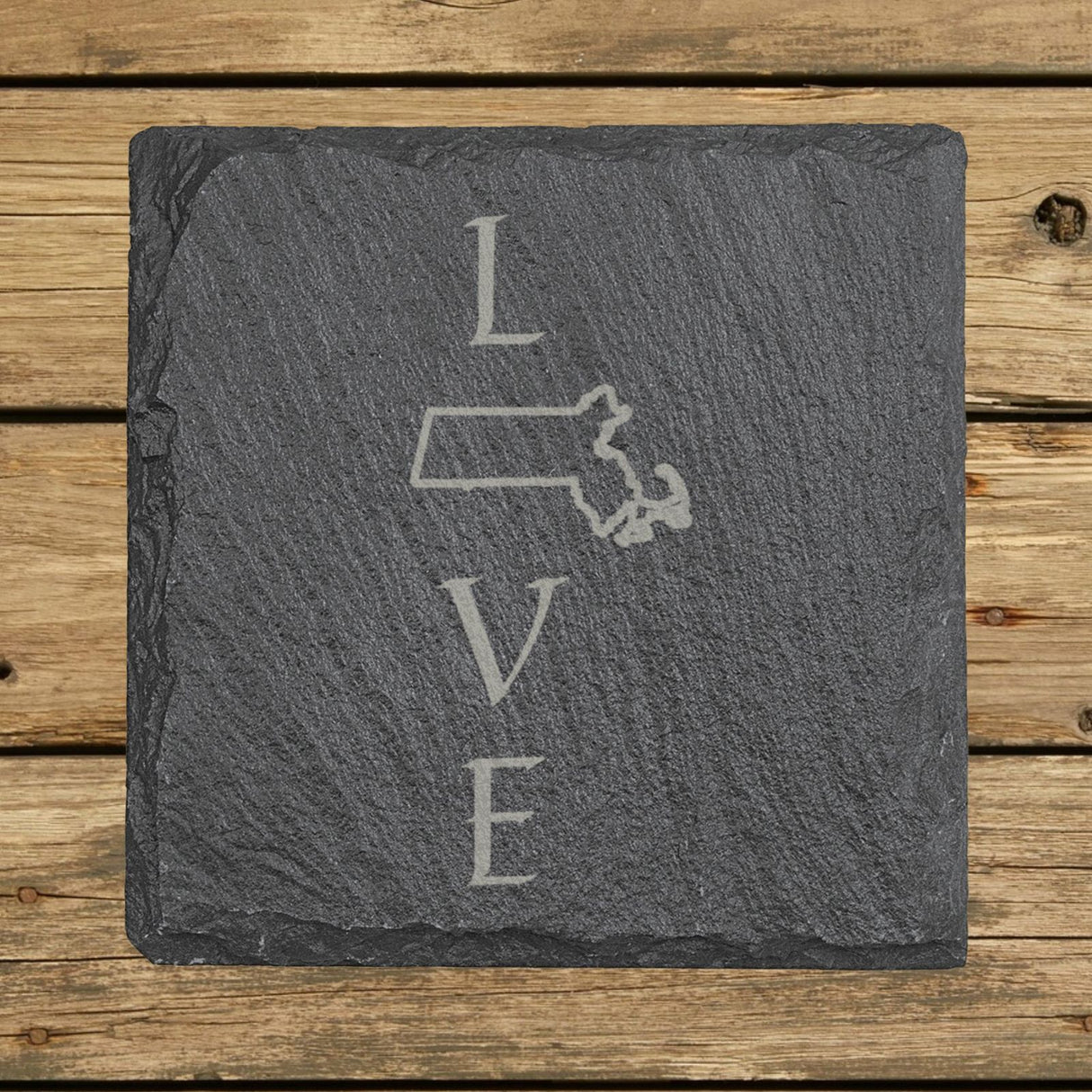 Massachusetts square slate coaster engraved with LOVE stacked vertically using the state as the letter O