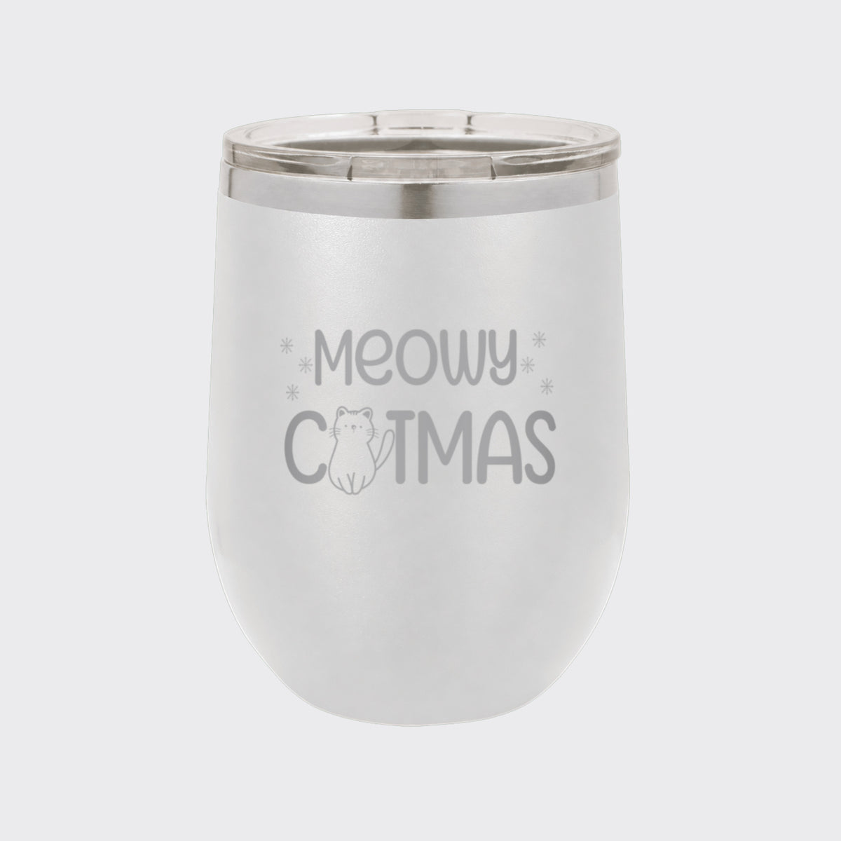 White 12 oz stemless wine tumbler laser engraved with "Meowy Catmas"