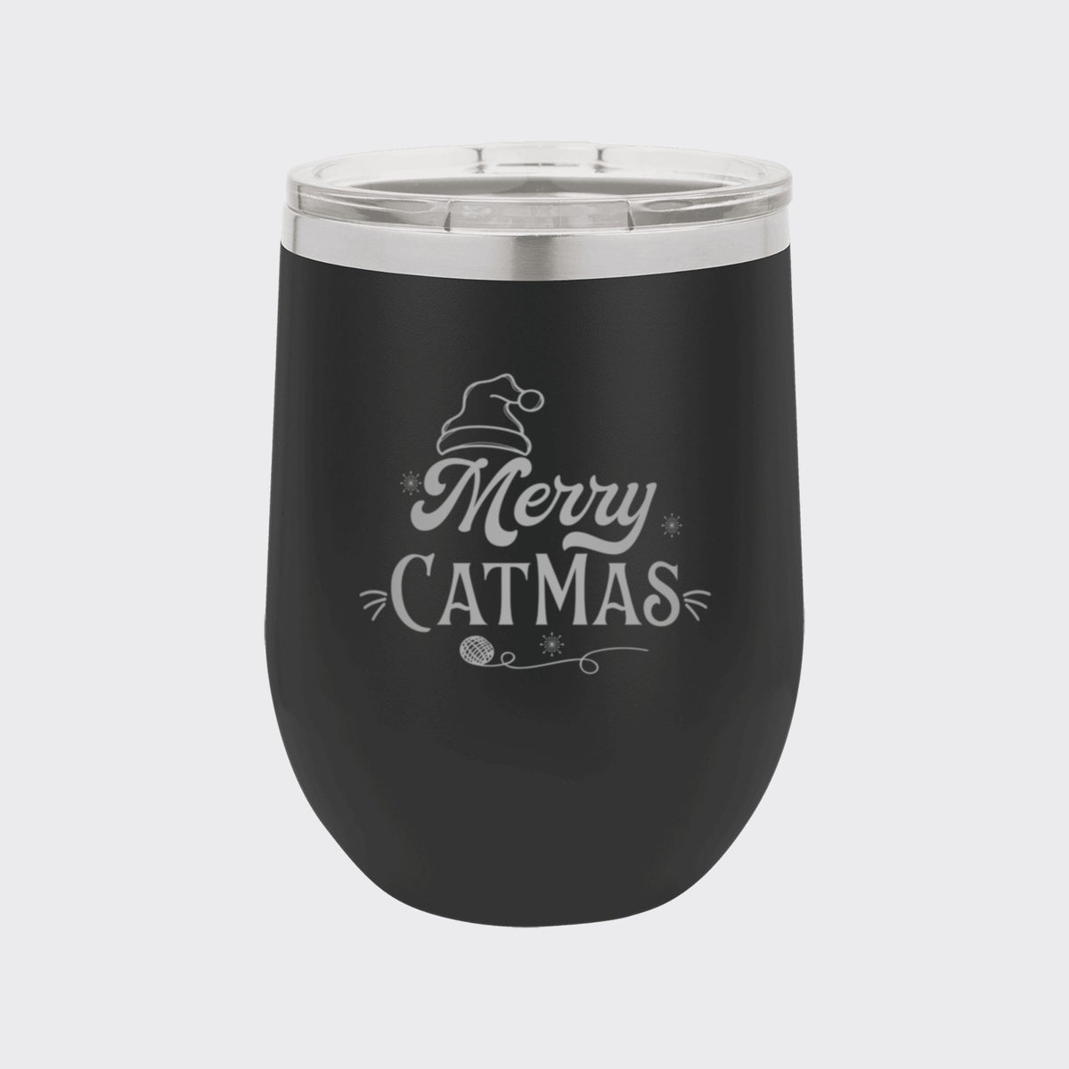 Black 12 oz stemless wine tumbler laser engraved with "Merry Catmas"