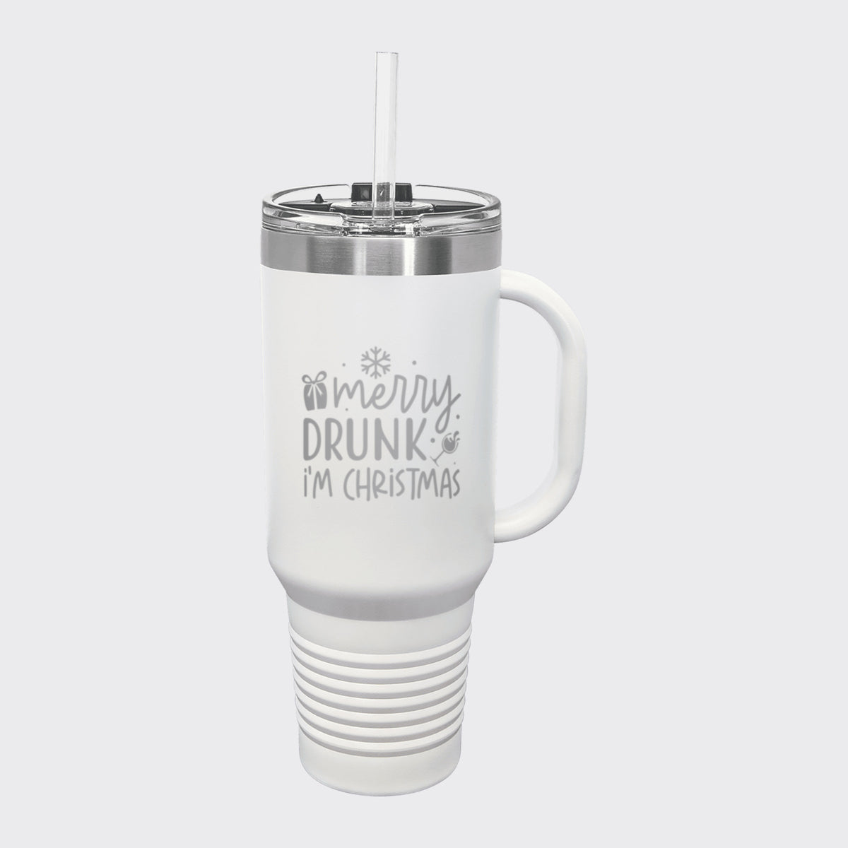 White 40 oz tumbler with handle and straw laser engraved with "Merry Drunk, I'm Christmas"