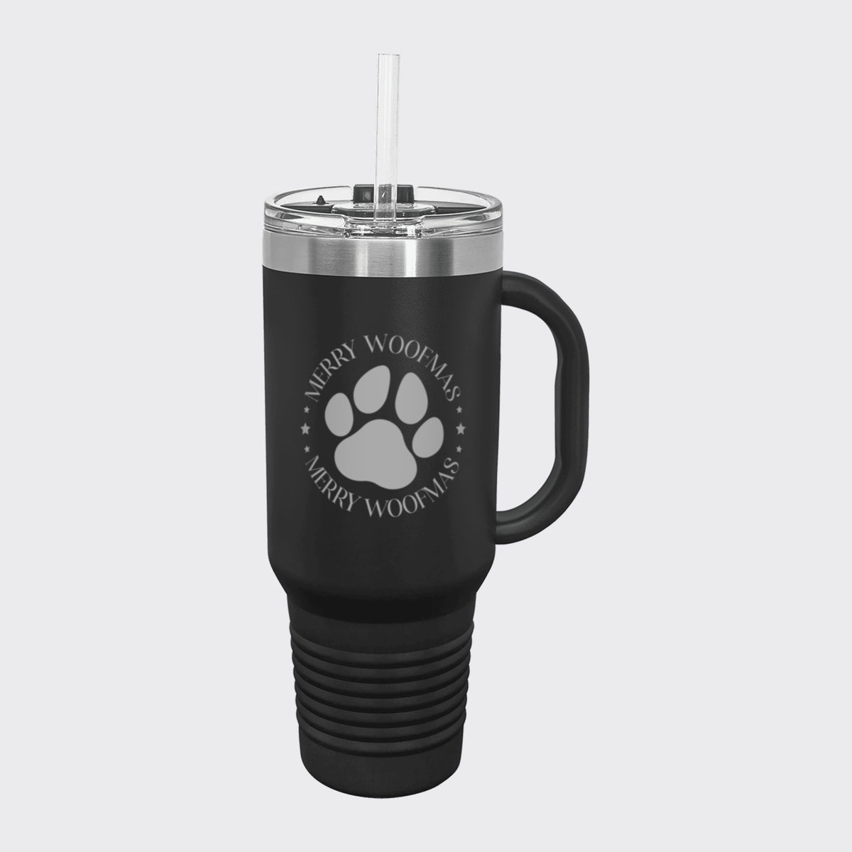 Black 40 oz tumbler with handle and straw laser engraved with "Merry Woofmas"