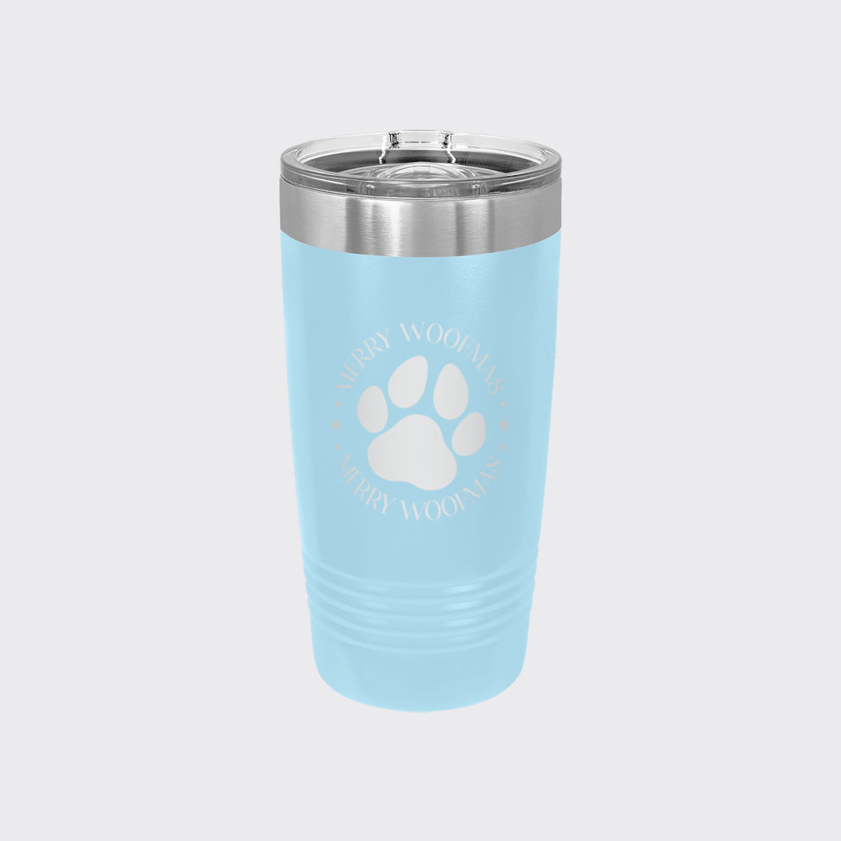 Light Blue 20 oz tumbler laser engraved with "Merry Woofmas"