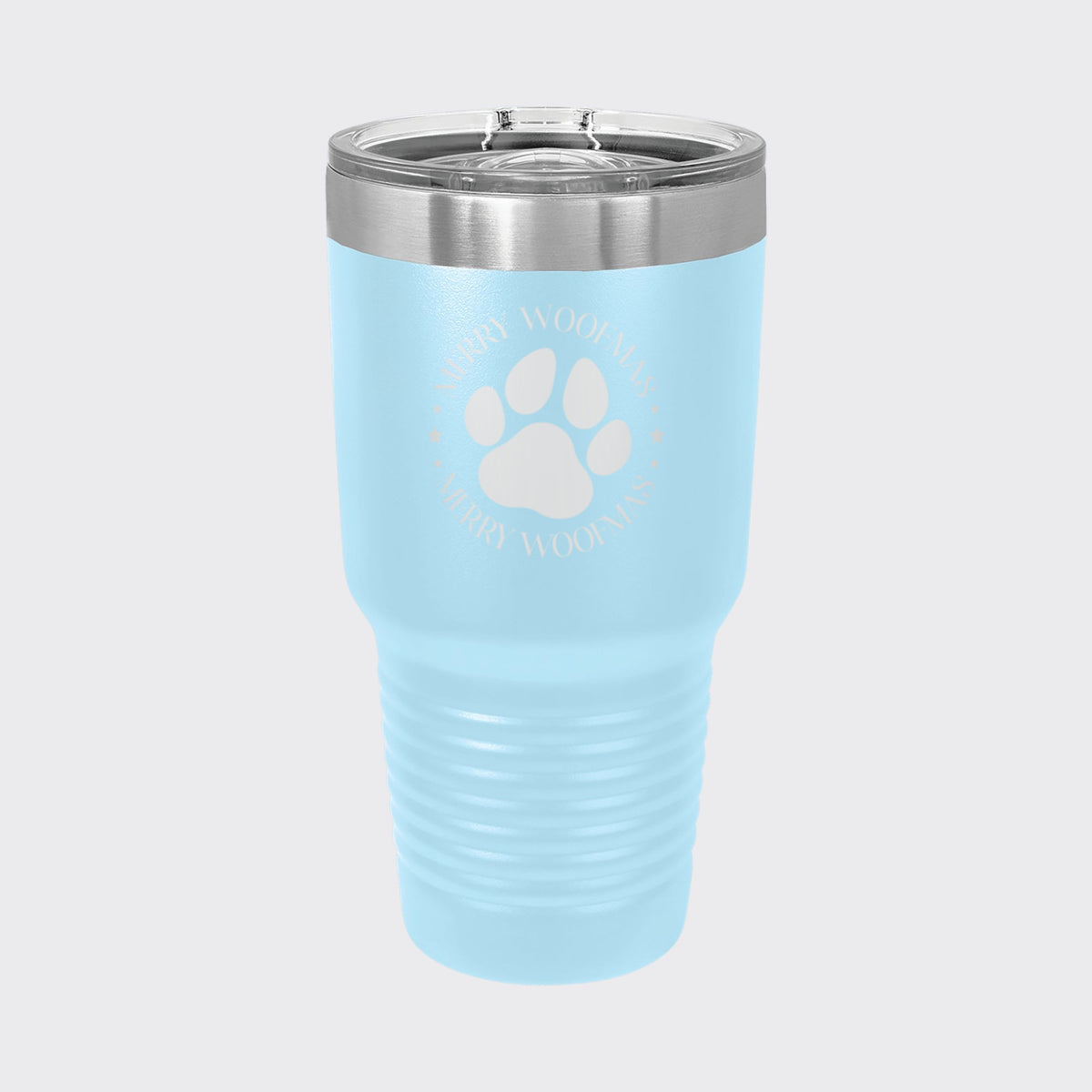 Light Blue 30 oz tumbler laser engraved with "Merry Woofmas"