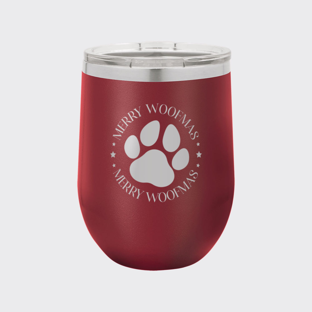 Maroon 12 oz stemless wine tumbler laser engraved with "Merry Woofmas"