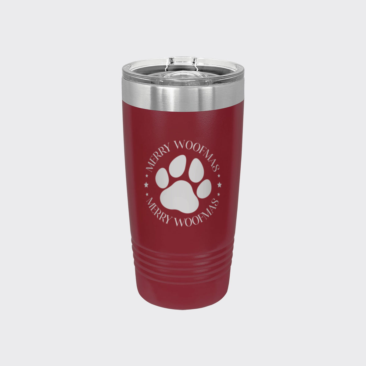 Maroon 20 oz tumbler laser engraved with "Merry Woofmas"