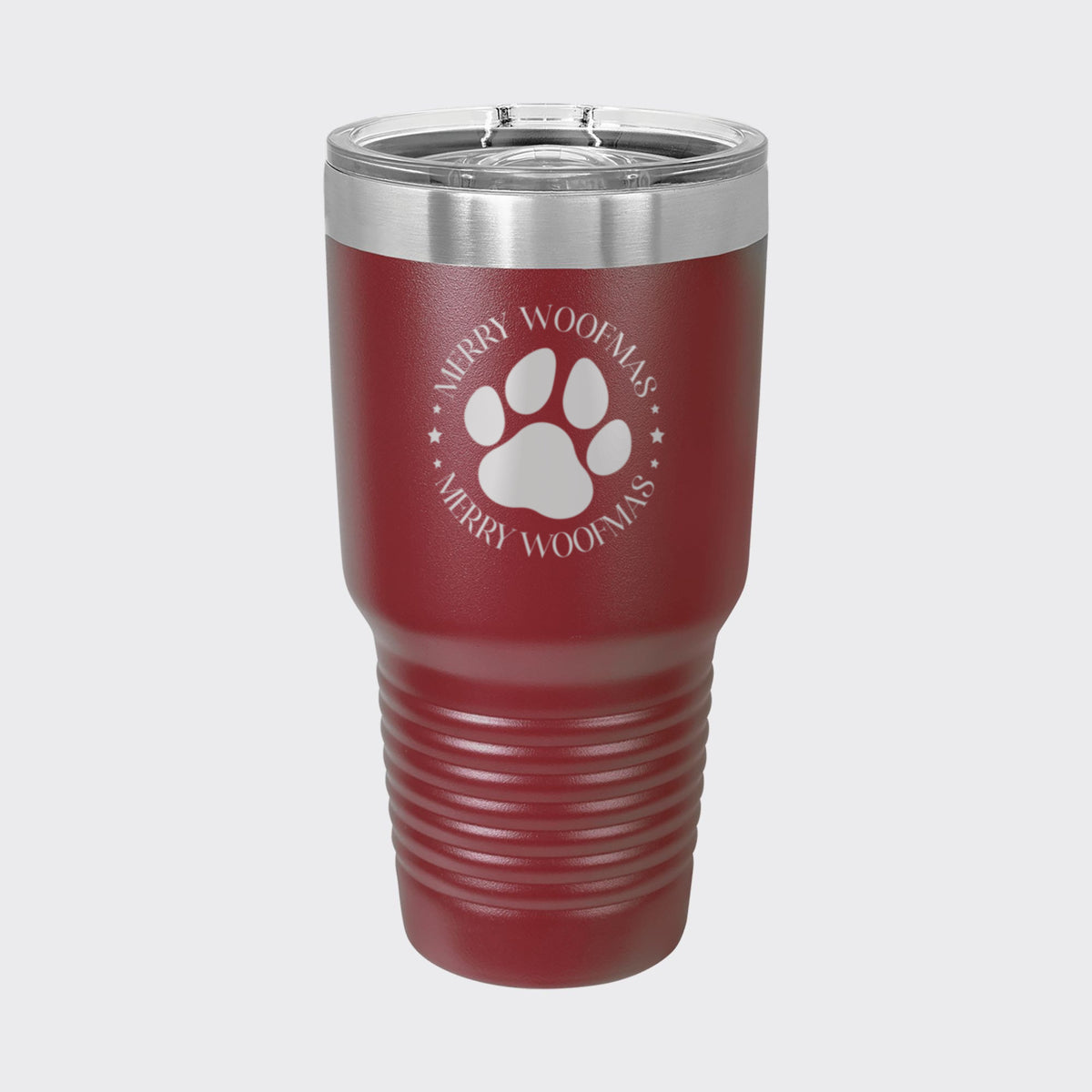 Maroon 30 oz tumbler laser engraved with "Merry Woofmas"