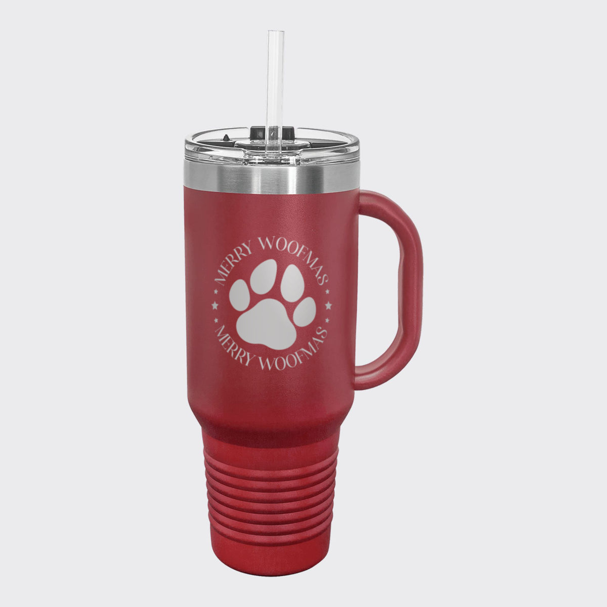 Maroon 40 oz tumbler with handle and straw laser engraved with "Merry Woofmas"