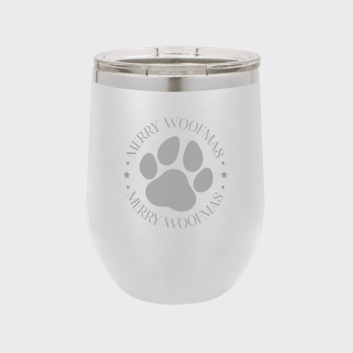White 12 oz stemless wine tumbler laser engraved with "Merry Woofmas"