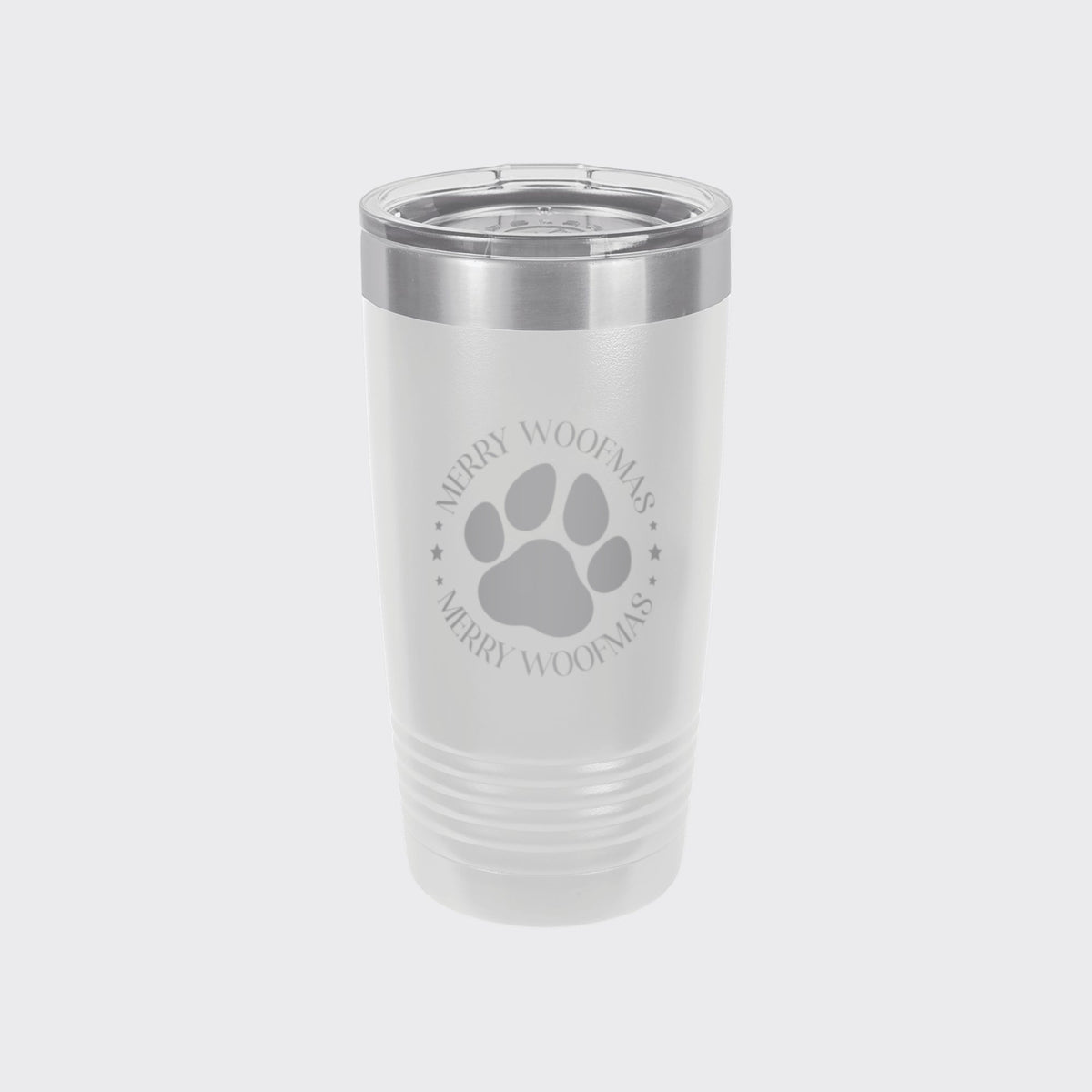 White 20 oz tumbler laser engraved with "Merry Woofmas"