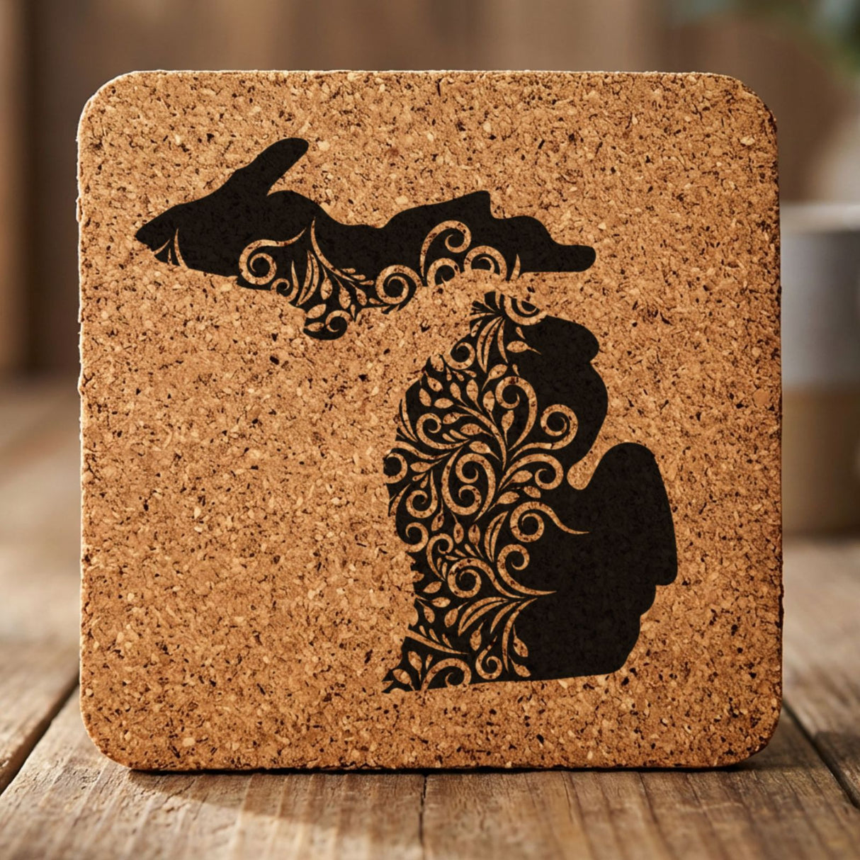 Michigan square cork coaster engraved with the state shape in ornate floral scrollwork