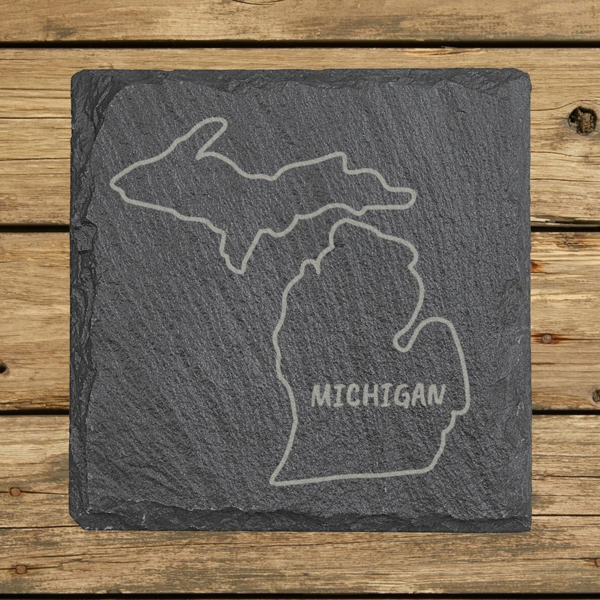 Michigan square slate coaster engraved with the state outline and MICHIGAN in hand-drawn brush lettering