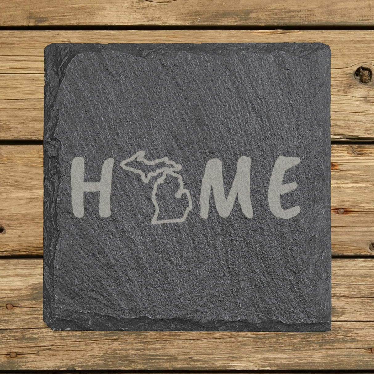 Michigan square slate coaster engraved with HOME using the state outline as the letter O